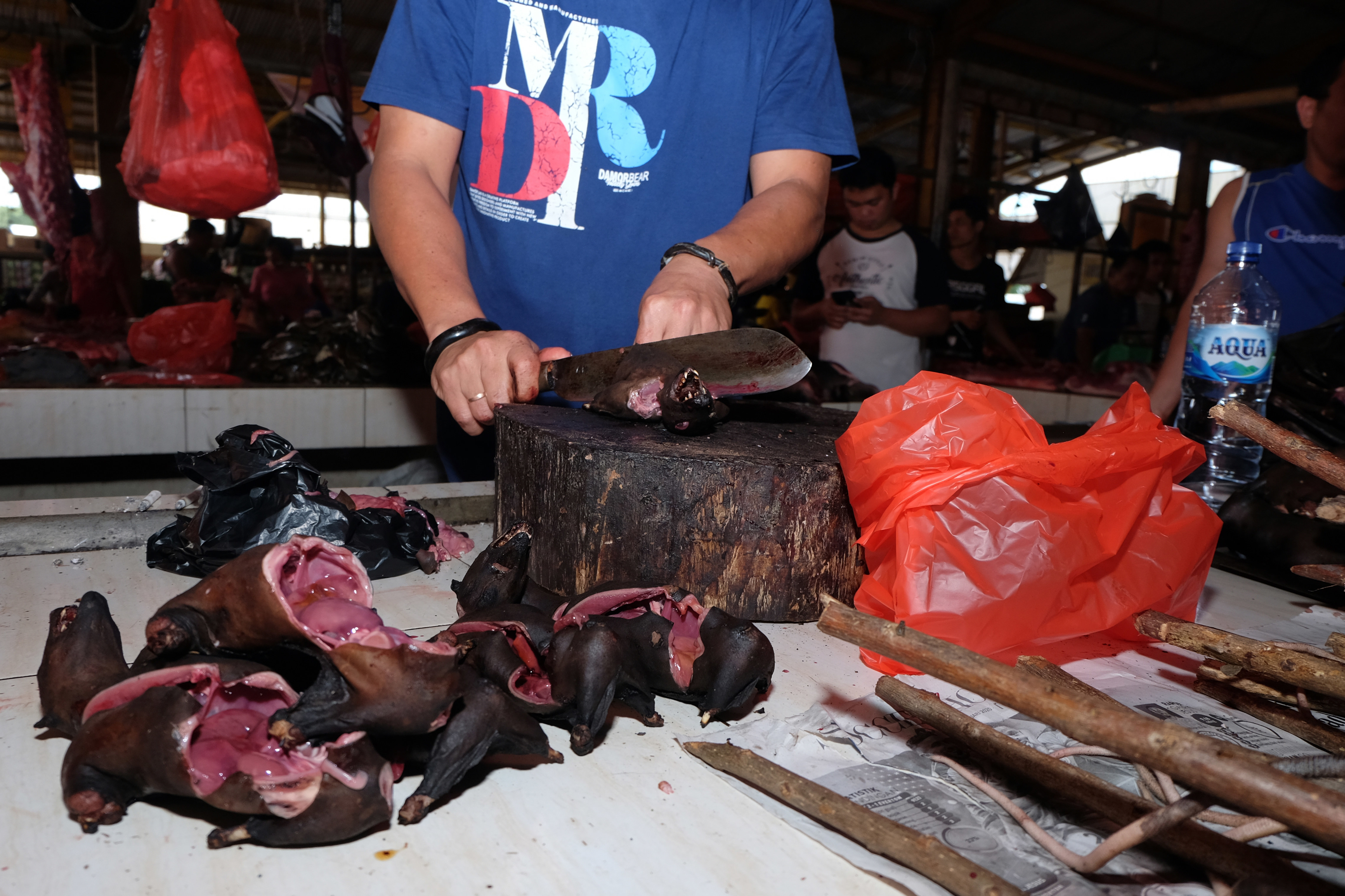 Traders selling bat meat.